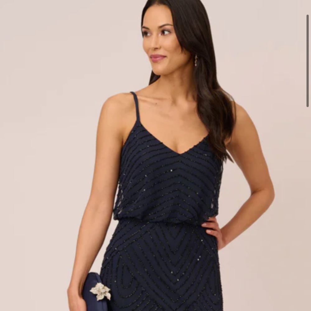 Hand-beaded navy formal gown